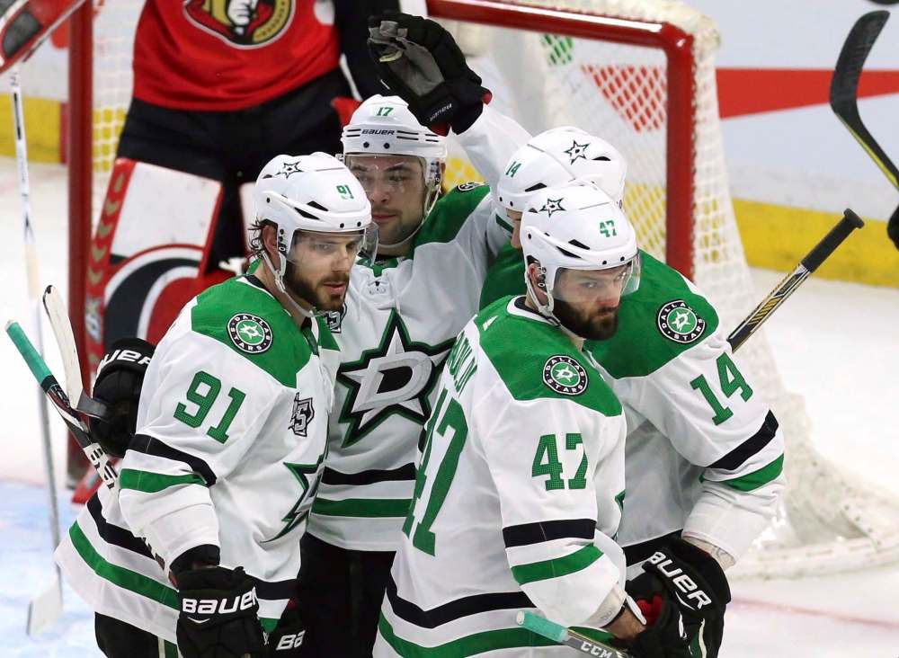 Tyler Seguin, left, celebrates his goal against the Ottawa Senators with Devin Shore (17), Jamie Benn (14) and Alexander Radulov (47) Friday. (Fred Chartrand / The Canadian Press)