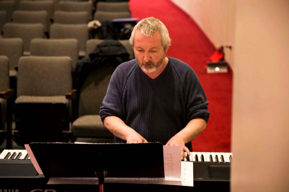 MIKAELA MACKENZIE / WINNIPEG FREE PRESS
Writer Shawn Coughlin plays accompaniment piano at a rehearsal for the rock opera Eastar at St. Mary’s Academy on March 11.