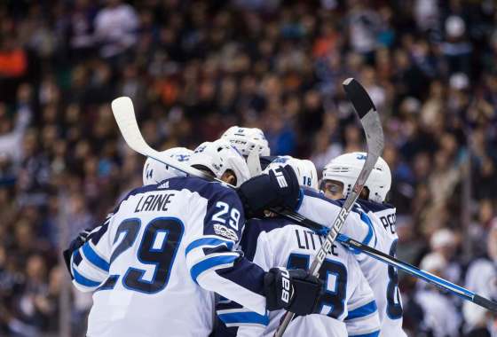 THE CANADIAN PRESS/Darryl DyckWinnipeg Jets celebrate Josh Morrissey's goal against the Vancouver Canucks in October.