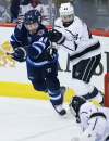 John Woods / The Canadian Press
Jets defenceman Josh Morrissey (left) tries to slow down the Los Angeles Kings’ Nate Thompson during Tuesday’s game.