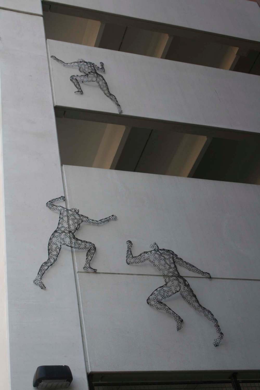 Detroit city planners have even repurposed dark, dangerous alleyways into backdrops for art.