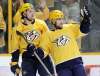 Viktor Arvidsson, right, celebrates with Filip Forsberg after scoring a goal against the Toronto Maple Leafs Thursday in Nashville. (Mark Humphrey / Associated Press files)