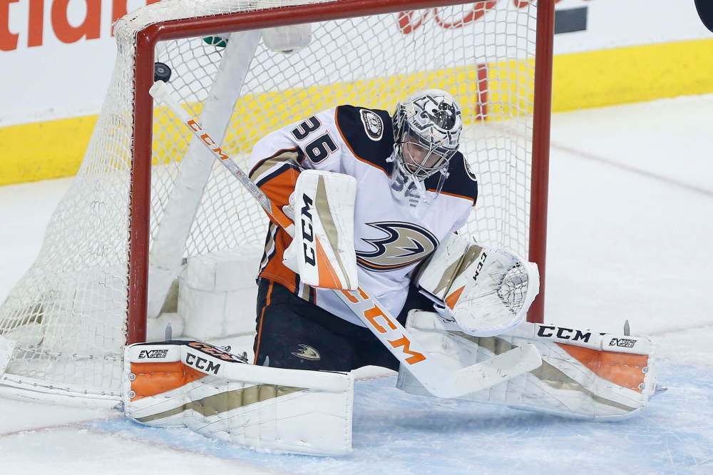 THE CANADIAN PRESS/John Woods
A shot by Winnipeg Jets centre Bryan Little goes in past Anaheim Ducks goaltender John Gibson during first period in Winnipeg, Friday.