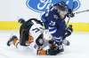 THE CANADIAN PRESS/John Woods
Winnipeg Jets right wing Patrik Laine and Anaheim Ducks right wing Ondrej Kase collide during overtime NHL action in Winnipeg, Friday. Laine has stated he won't shy away from blocking shots even after leaving Tuesday's game against the L.A. Kings after blocking an Alec Martinez shot.