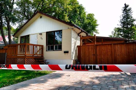 At first, the police investigation focused on an arson and break-in at the 5th Avenue bungalow, and it wasn't until later that allegations emerged that a man may have been hired to set fire to the home. (Boris Minkevich / Winnipeg Free Press files)