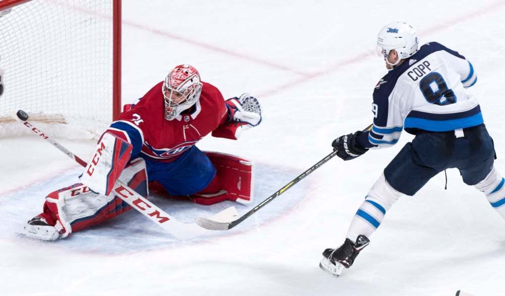 THE CANADIAN PRESS/Paul Chiasson
Montreal Canadiens goaltender Carey Price stops a shot off Winnipeg Jets' Andrew Copp during second period.