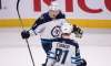 THE CANADIAN PRESS/Paul Chiasson
Winnipeg Jets' Tyler Myers congratulates teammate Kyle Connor after Connor scored the winning goal during overtime to beat the Montreal Canadiens 5-4 in NHL hockey action Tuesday in Montreal.