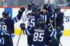 THE CANADIAN PRESS/John Woods
Winnipeg Jets' celebrate a game-winning goal against the Los Angeles Kings in overtime. The expectations for the Jets have gone up this season - from hoping to make the playoffs, to being serious Stanley Cup contenders.