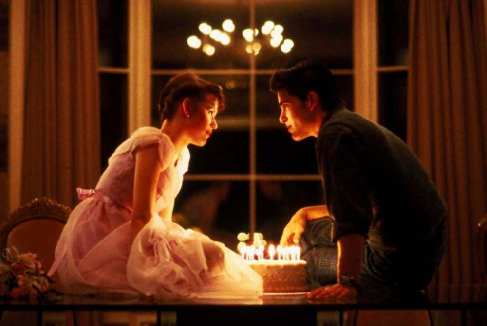 Molly Ringwald, left, and Michael Schoeffling in a scene from Sixteen Candles. (Universal Pictures)
