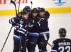 PHIL HOSSACK / WINNIPEG FREE PRESS
Winnipeg Jets celebrate Morrow's first ever playoff game-winning goal, Wednesday.