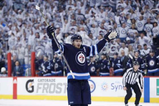 THE CANADIAN PRESS/John WoodsWinnipeg Jets' Mark Scheifele celebrates his goal against the Minnesota Wild during the second period on Wednesday.