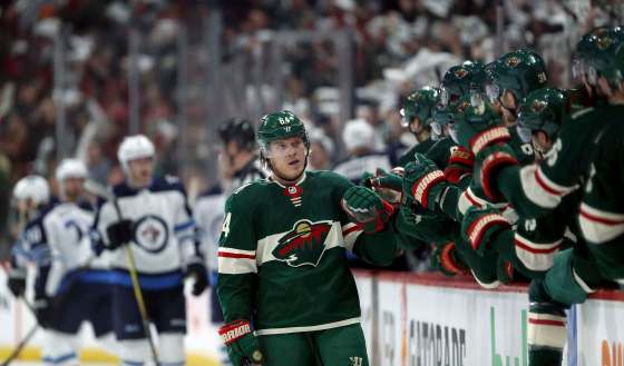 TREVOR HAGAN / WINNIPEG FREE PRESSMinnesota Wild Mikael Granlund (64) scores on Winnipeg Jets' goaltender Connor Hellebuyck (37) during first period NHL playoff hockey action at the Xcel Energy Center in St.Paul, Minnesota, Sunday, April 14, 2018.