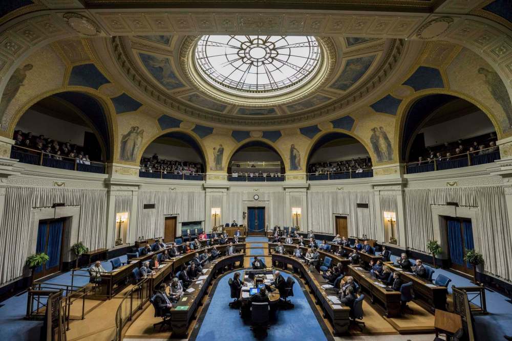 Manitoba Finance Minister Cameron Friesen delivers the 2018 budget at the Manitoba Legislature in Winnipeg on March 12, 2018. The Manitoba government is backing down from a plan to stop publishing notices of everything from environmental protection changes to public health orders in newspapers. Cathy Cox, the minister for sport, culture and heritage, says the government realizes it was moving too fast, and will not enact the relevant sections of an omnibus bill now before the legislature. THE CANADIAN PRESS/David Lipnowski