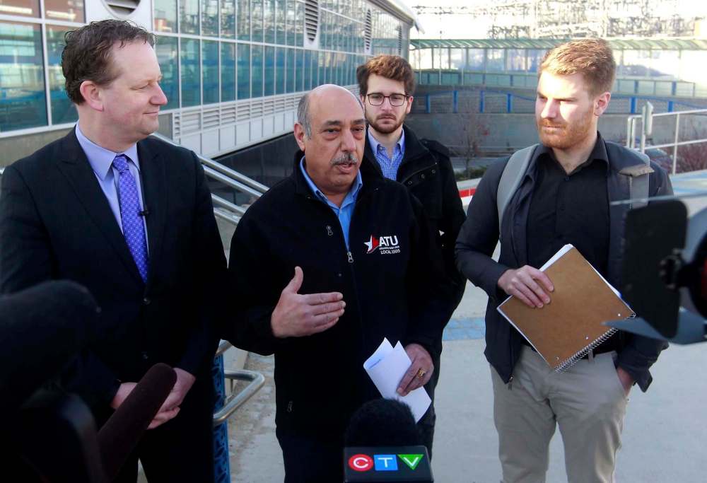 From left, MLA from Wolseley Rob Altemeyer, Amalgamated Transit Union 1505 president Aleem Chaudhary, transit rider/supporter Jesse Blackman, and Functional Transit Winnipeg chairperson Joseph Kornelsen say the province should use carbon tax revenue to finance the upgrade Transit’s fleet to electric. (Boris Minkevich / Winnipeg Free Press)