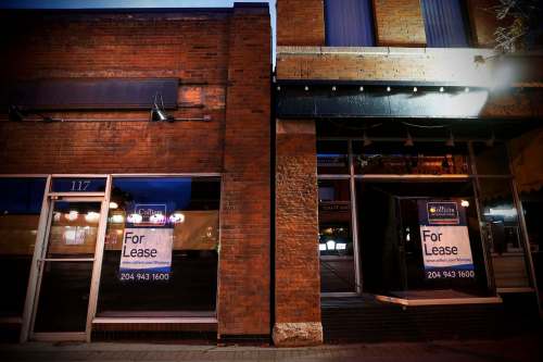 Vacant windows line the streets in Osborne Village. (John Woods / Free Press files)