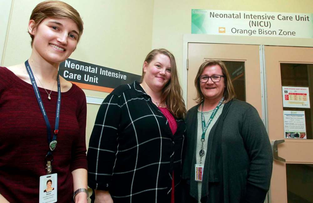 St. Boniface volunteer coordinator Andrea Wiebe (from left), Holly Marie, and Karen Netzel, volunteer coordinator at Health Sciences Centre. All three are mothers whose children have been in the NICU.  (Boris Minkevich / Winnipeg Free Press)