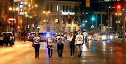 Jets fans celebrate at Portage and Main Friday evening. (Phil Hossack / Winnipeg Free Press)