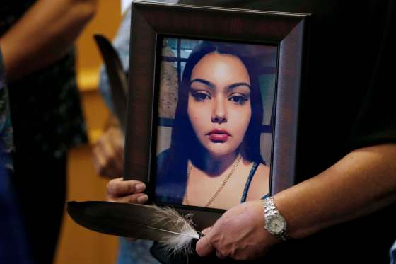 John Woods / The Canadian Press FilesDelores Daniels holds a photo of her daughter Serena McKay who was murdered in Sagkeeng.