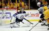 TREVOR HAGAN / WINNIPEG FREE PRESS
Winnipeg Jets' goaltender Connor Hellebuyck watches the puck against the Nashville Predators' during first period Friday.