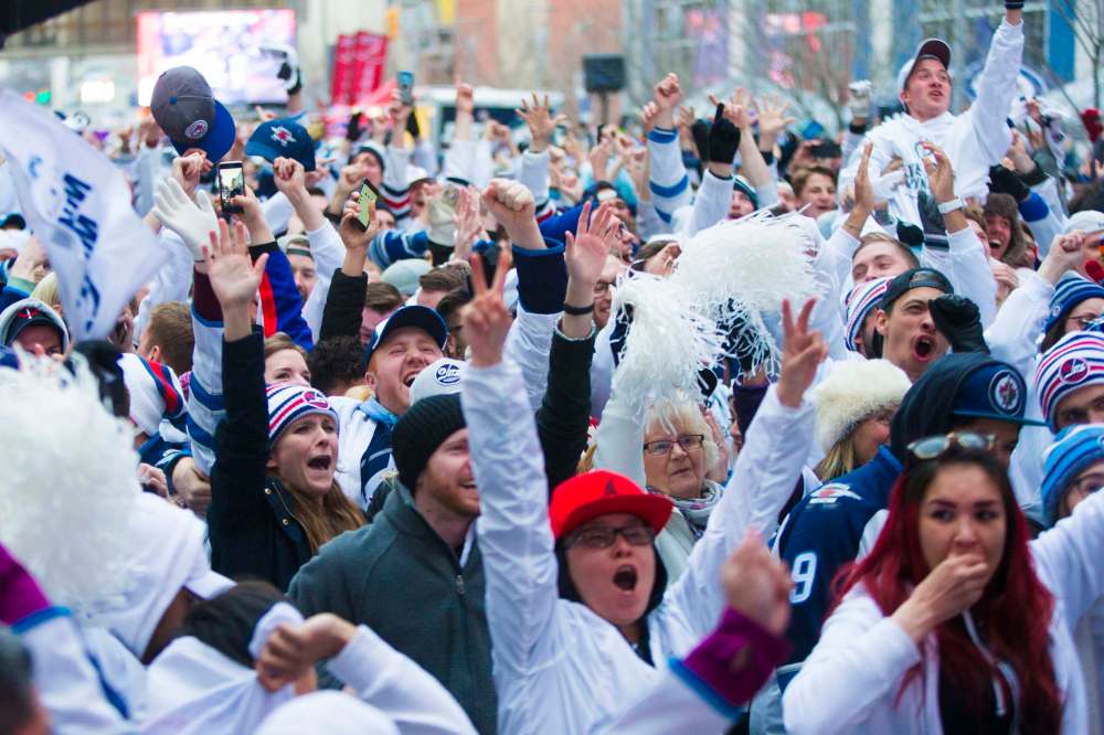 MIKAELA MACKENZIE / WINNIPEG FREE PRESS
The crowd at the Jets whiteout street party during a first-round matchup against the Minnesota Wild. Organizers are planning to add a bike valet to the event for the Jets' second-round series games against the Nashville Predators starting this Tuesday.