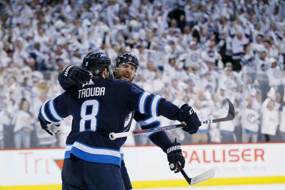 John Woods / Winnipeg Free PressWinnipeg Jets' Jacob Trouba and Blake Wheeler celebrate Trouba's goal against the Nashville Predators in the second period of game three in Winnipeg, Tuesday.