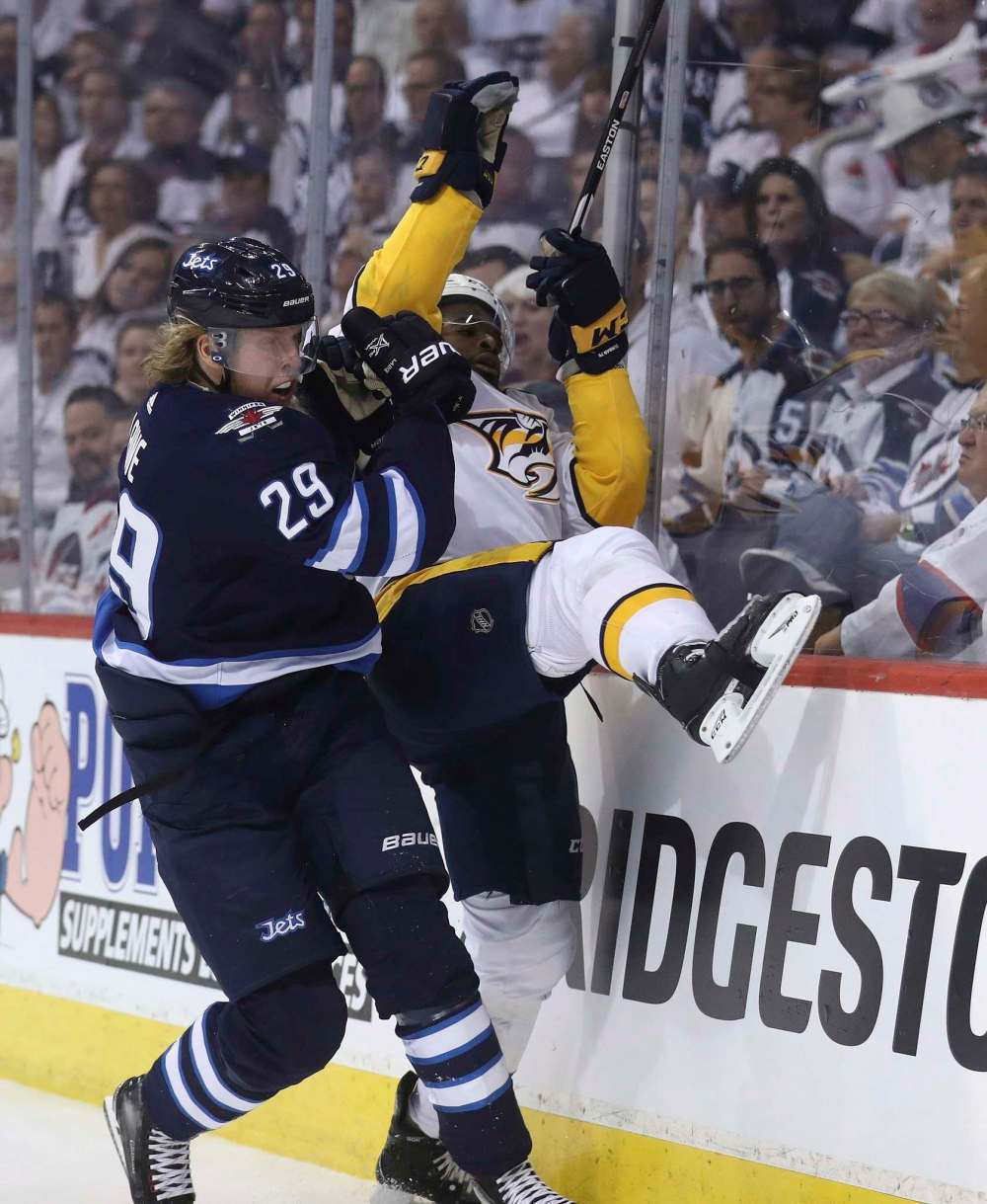 THE CANADIAN PRESS/Trevor Hagan
Winnipeg Jets' Patrik Laine hits Nashville Predators' P.K. Subban during second period Tuesday.