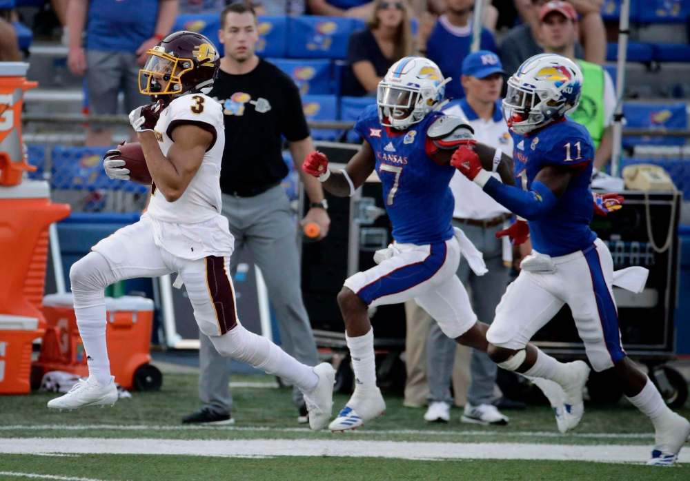 THE CANADIAN PRESS/AP-Charlie Riedel
Central Michigan wide receiver Mark Chapman (left) was selected first overall by the Hamilton Tiger-Cats at the CFL draft.