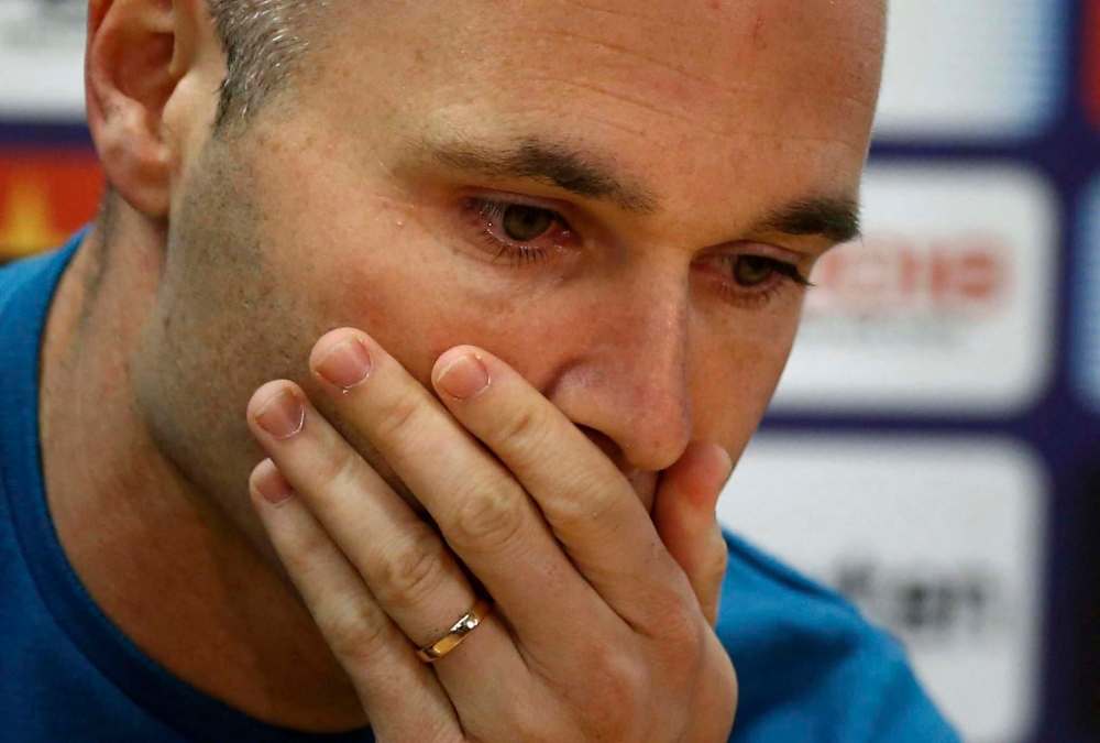 Manu Fernandez / The Associated Press
F.C. Barcelona player Andres Iniesta reacts during a news conference announcing he is leaving the club, in Barcelona, Spain, Friday, April. 27, 2018. Andres Iniesta says that he will leave Barcelona this summer after 16 trophy-packed seasons with the Spanish club. Iniesta, who turns 34 on May 11, says Friday “this season is the last.”