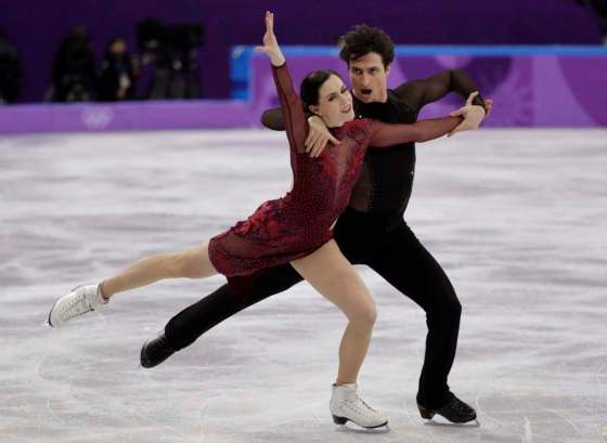 Scott Moir and Tessa Virtue of Canada perform in the ice dance free dance figure skating team event in the Gangneung Ice Arena at the 2018 Winter Olympics in Gangneung, South Korea, Monday, Feb. 12, 2018. (David J. Phillip / The Associated Press Files)
