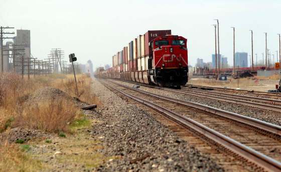 BORIS MINKEVICH / WINNIPEG FREE PRESSA train waits on the tracks near Dugald Road near the Perimeter Highway Tuesday.
