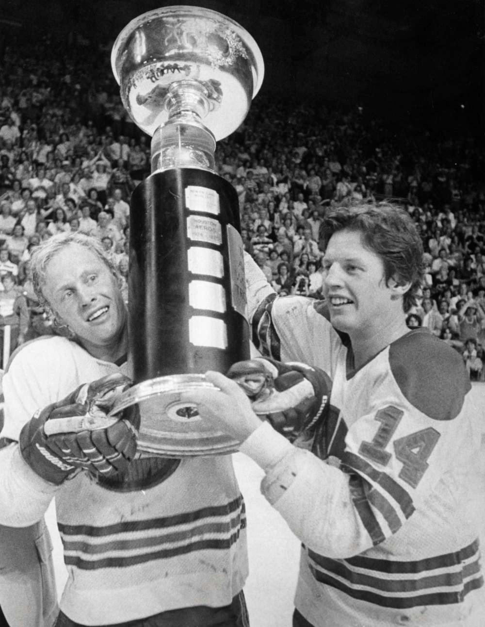THE CANADIAN PRESS FILES
Winnipeg Jets' players Anders Hedberg (left) and Ulf Nilsson hoist the Avco Cup after winning the World Hockey Association championship in Winnipeg, May 23, 1978.