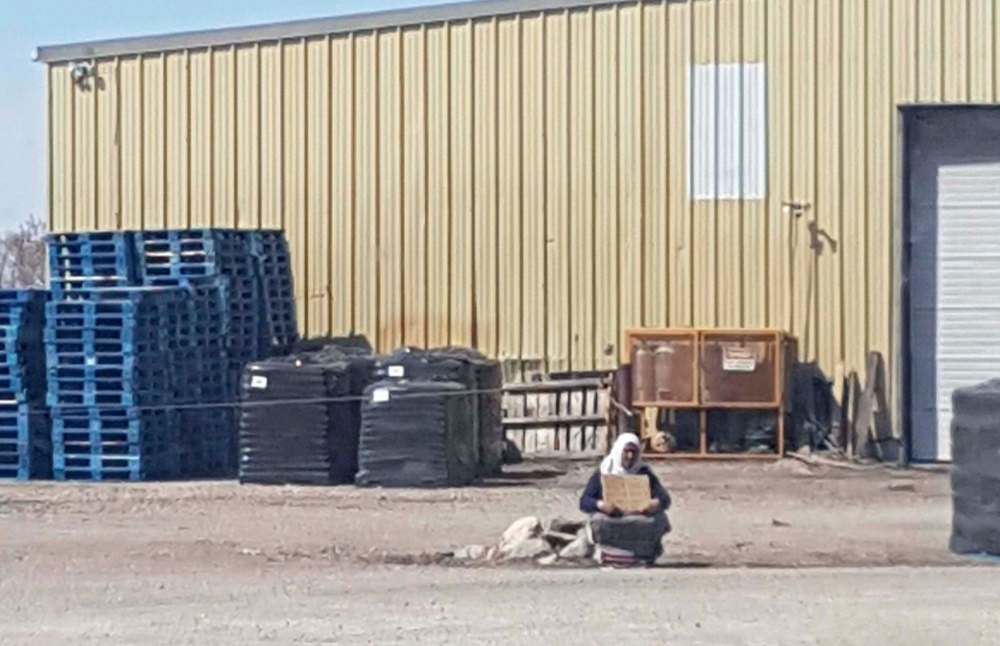 SUPPLIED
Photos show two women begging outside Grand Mosque on Waverley Friday, May 4. They say they are from Ontario.