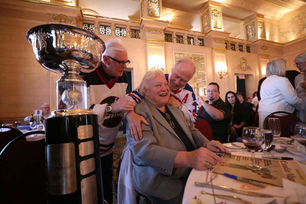 RUTH BONNEVILLE / WINNIPEG FREE PRESS
Legendary Winnipeg Jets linemates Ulf Nilsson (left), Bobby Hull (centre) and Anders Hedberg pose for photos next to the Avco Cup Saturday at the team reunion of the WHA-era Jets.