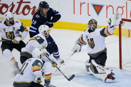 JOHN WOODS/ WINNIPEG FREE PRESSVegas Golden Knights goaltender Marc-Andre Fleury stops a shot by Winnipeg Jets' Patrik Laine during first period of Game 2 of the NHL Western Conference Final in Winnipeg on Monday.