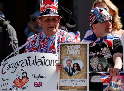 Frank Augstein / The Associated Press
Well-wishers watch a rehearsal of the royal wedding in Windsor, England, on Thursday. Doug won't be there, but he will be dressed for the occasion in a royal blue bathroom.