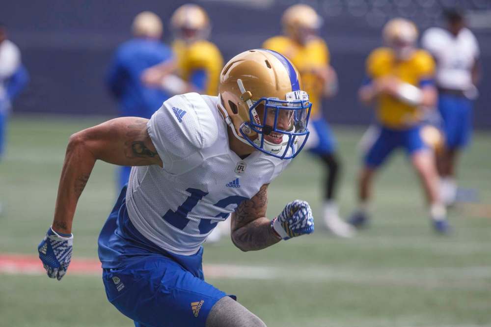 MIKE DEAL / WINNIPEG FREE PRESS
Rashaun Simonise runs a route at Bombers training camp at Investors Group Field on Thursday.