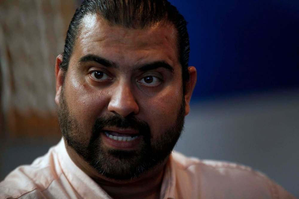 PHIL HOSSACK / WINNIPEG FREE PRESS
Sinan Aboud, who came to Canada from Iraq in 2002, plans to donate earnings from his new restaurant to Faeza Mejo.