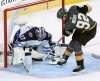 TREVOR HAGAN / WINNIPEG FREE PRESS Vegas Golden Knights' Tomas Nosek (92) scores on Winnipeg Jets' goaltender Connor Hellebuyck (37) during the second period of game 4 of their Western Conference Final series in Las Vegas, Friday, May 18, 2018.