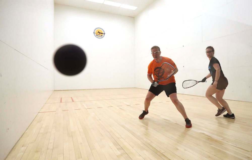 Photos by TREVOR HAGAN / WINNIPEG FREE PRESS
Winnipeg’s Jennifer Saunders (left) moves into position in Canadian racquetball women’s singles championship play against Christine Richardson at the University of Winnipeg on Saturday.