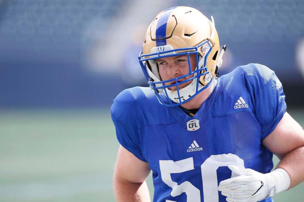 JOHN WOODS / THE CANADIAN PRESS FILES
New Bombers linebacker Adam Bighill isn’t afraid to make pads pop at training camp.