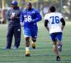 PHIL HOSSACK / WINNIPEG FREE PRESS
Blue Bomber Faith Ekakitie (centre) runs through drills at rookie camp in 2017.