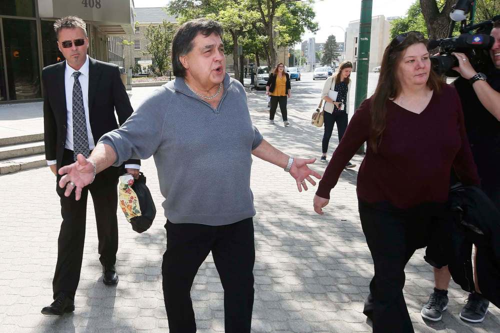 JOHN WOODS / WINNIPEG FREE PRESSFrank Ostrowski leaves the Law Courts after a day of testimony Monday. The Winnipeg hairstylist spent 23 years in prison for a crime he says he didn't commit. The Crown is seeking a stay while his defence team is asking for an acquittal.