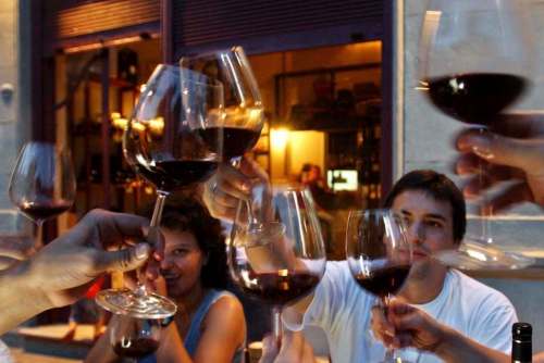 Wine adds a charm and measure of honesty to gatherings. (Natacha Pisarenko / Associated Press files)