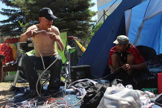 Ryan Thorpe / Winnipeg Free PressTerry Johnsen, 57, worked on a piece of scrap metal with an unnamed friend at All Saints Anglican Church days before a tent city was dismantled.