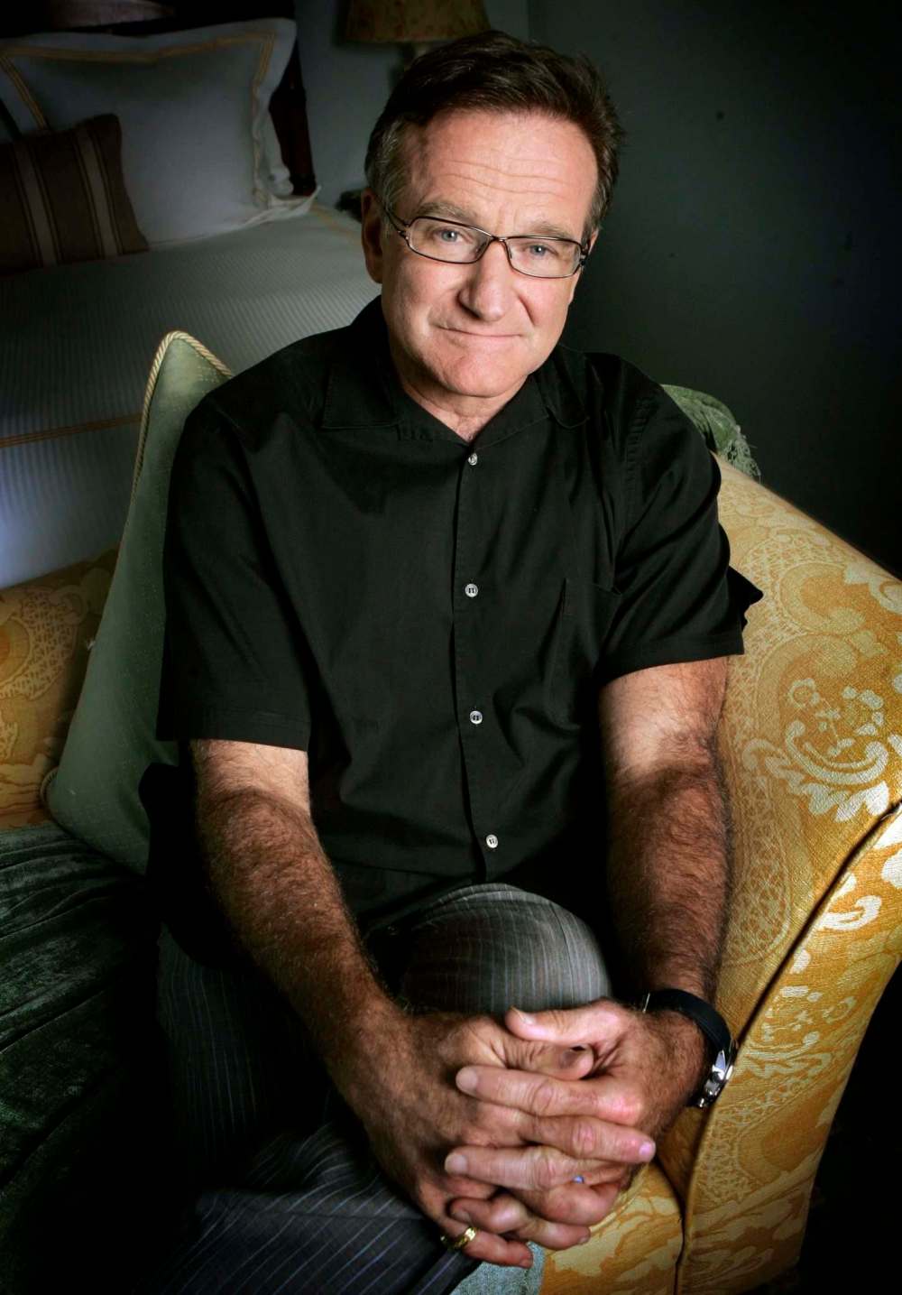 Williams posing to promote his film License To Wed. (Reed Saxon / Associated Press files)