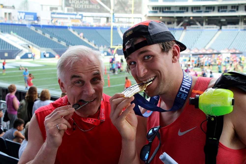 Dylan Bronk, right, is the third generation Bronk to cross the finish line of the 42 km Manitoba Marathon. His dad, Bob Bronk, left, and grandfather (not pictured) ran in the inaugural event in 1979.