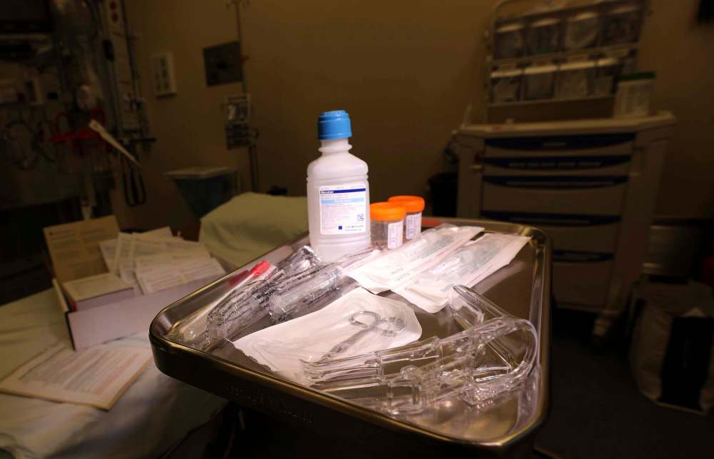 Tools and a kit set out on a tray from an IERHA Sexual Assault Supple Kit in an emergency room at the Selkirk Regional Health Centre that can be used to obtain evidence if a patient desires. (Ruth Bonneville / Winnipeg Free Press)