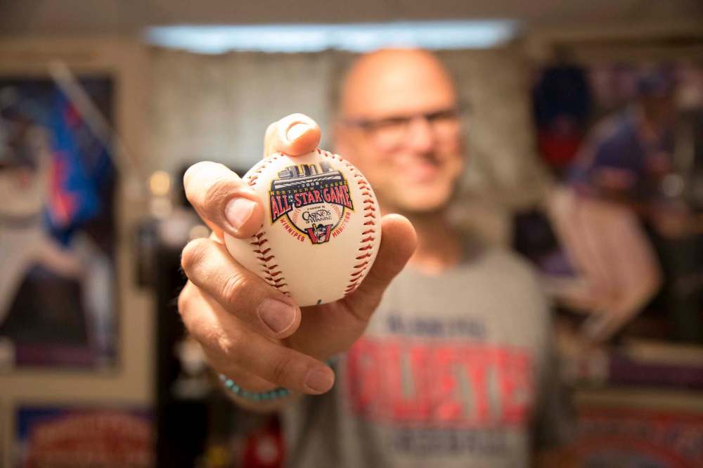 Mike Sudoma / Winnipeg Free Press
Craig and Jill Kuhlman
Sports memorabilia of all kinds all the way from the floor to the ceiling.
- for David Sanderson story on Winnipeg Goldeyes fans
June 22, 2018