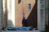 RYAN THORPE / WINNIPEG FREE PRESS FILES
A man sleeps outside the side entrance of All Saints Anglican Church in West Broadway on May 28, where a 