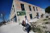 PHIL HOSSACK / WINNIPEG FREE PRESS
Ridong his bike in for supplies, Warren Catcheway was taken by suprise Thursday as he and other customers found out the doors close Saturday at Neechi Commons.